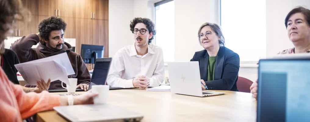 Different persons in a meeting