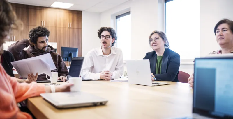 Different persons in a meeting